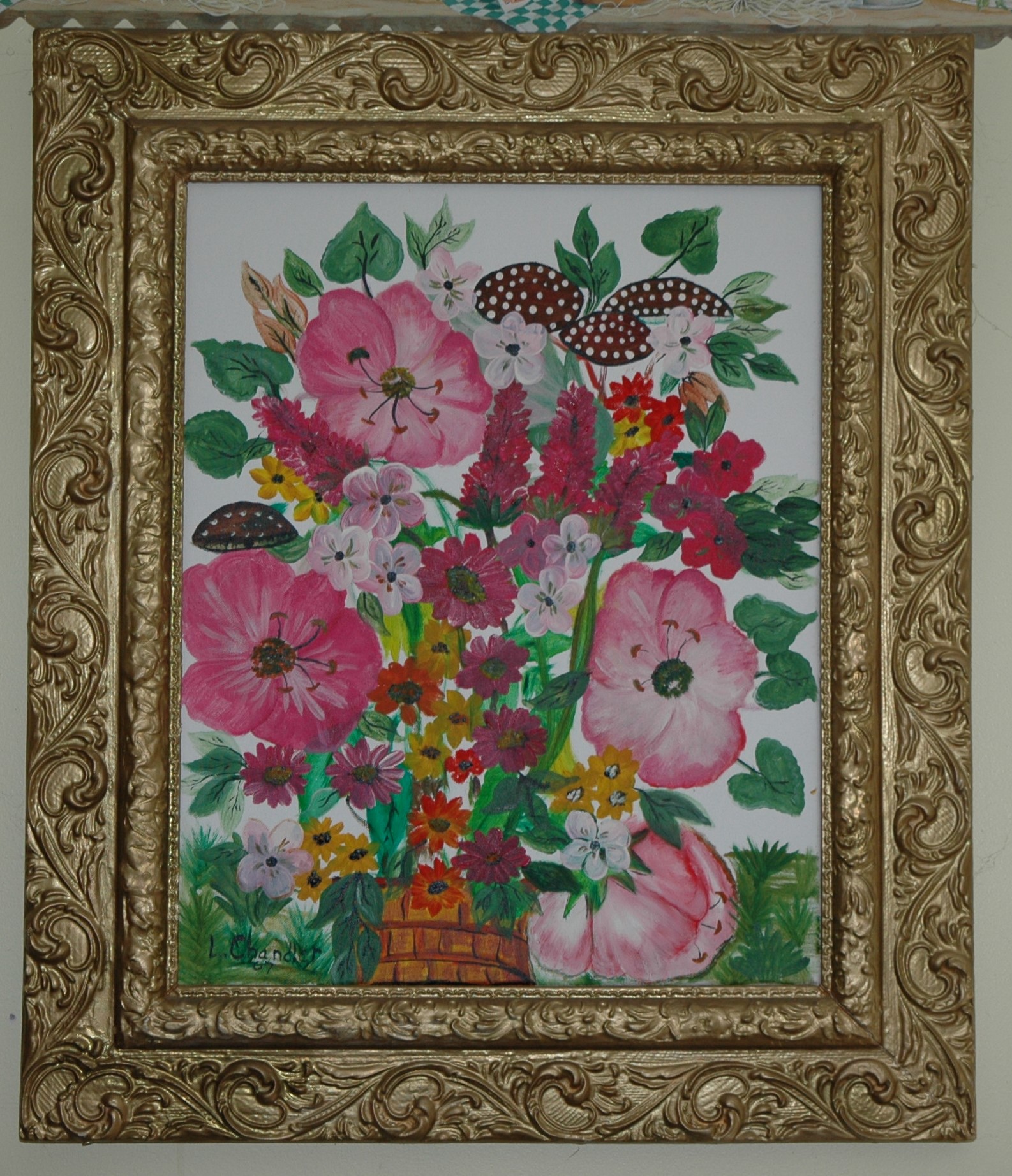 Flower arangement in a Golden Frame By Loretta Chandler